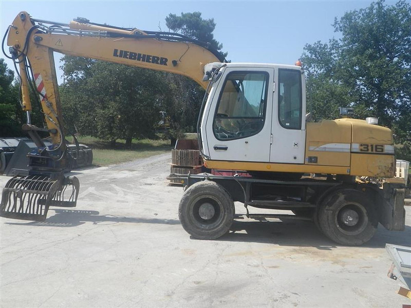 Liebherr A316Li - Багер: снимка 3 Liebherr A316Li - Багер: снимка 3