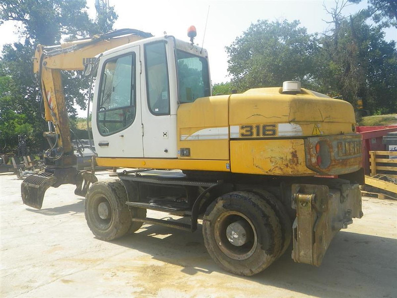 Liebherr A316Li - Багер: снимка 2 Liebherr A316Li - Багер: снимка 2