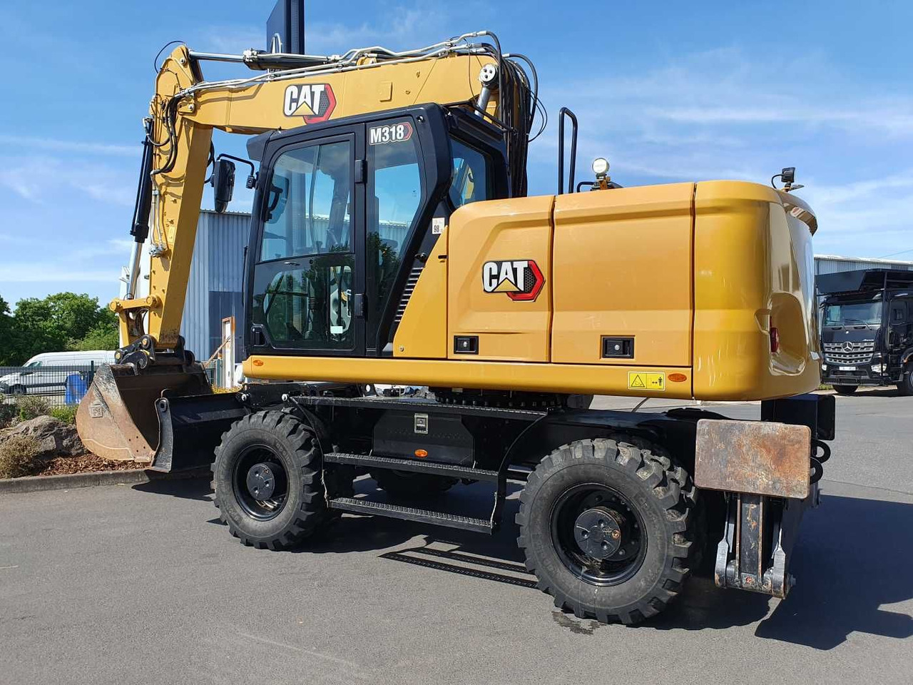 CAT M318 / 2022 / nur 286h! / Tieflöffel / Pratzen - Колесен багер: снимка 3 CAT M318 / 2022 / nur 286h! / Tieflöffel / Pratzen - Колесен багер: снимка 3