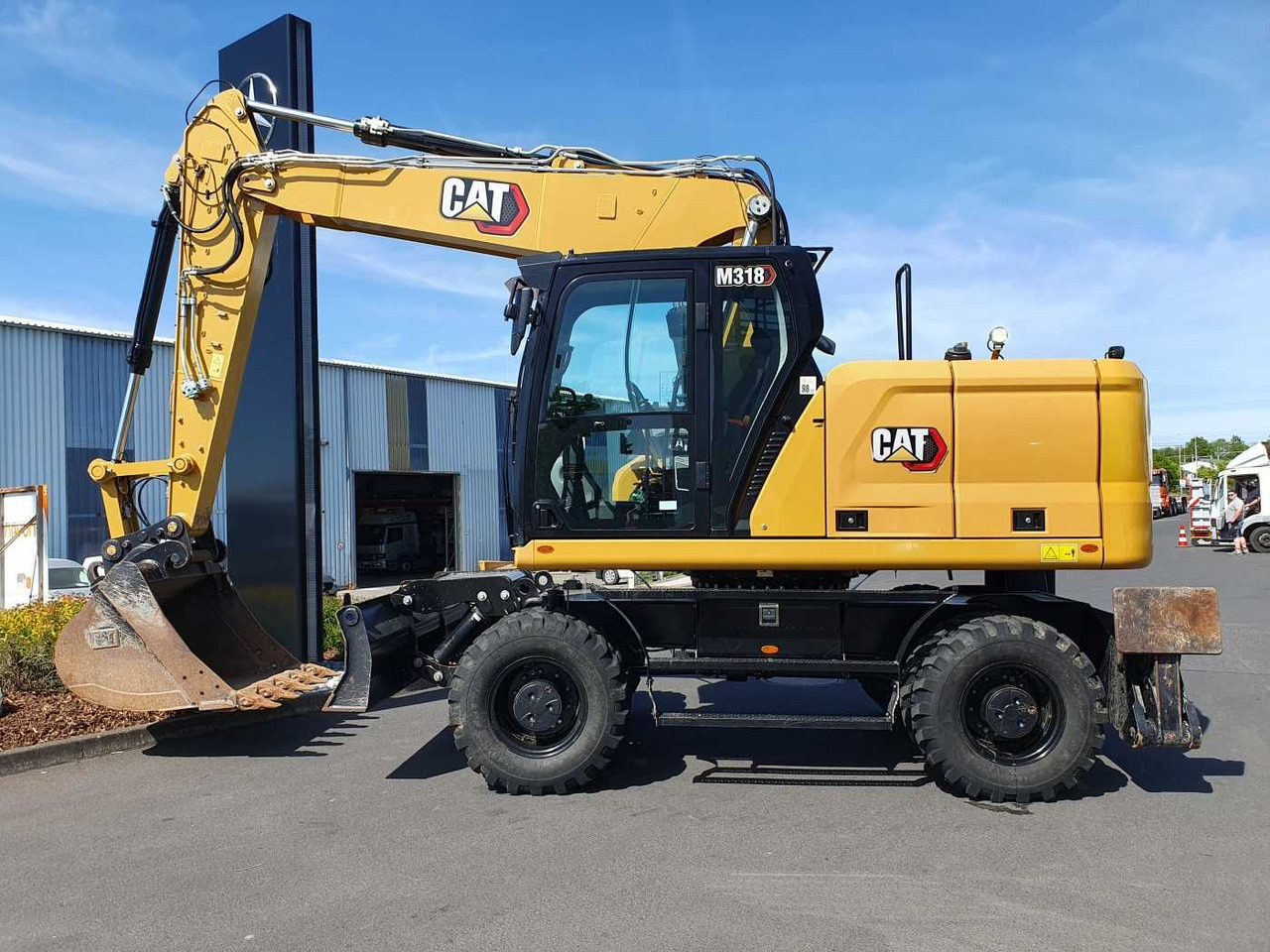 CAT M318 / 2022 / nur 286h! / Tieflöffel / Pratzen - Колесен багер: снимка 2 CAT M318 / 2022 / nur 286h! / Tieflöffel / Pratzen - Колесен багер: снимка 2