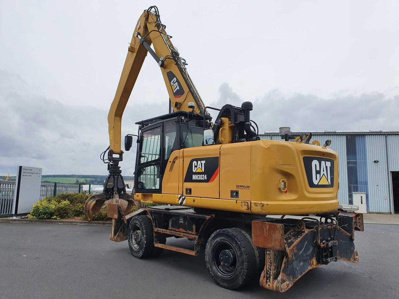 CAT MH3024 / MH 3024 / Greifer / 2018 / 9.424h - Колесен багер: снимка 5 CAT MH3024 / MH 3024 / Greifer / 2018 / 9.424h - Колесен багер: снимка 5