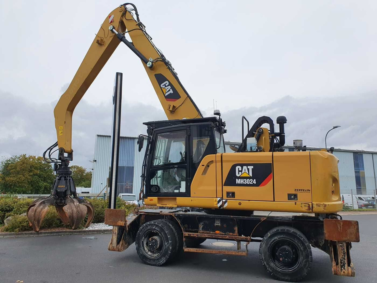 CAT MH3024 / MH 3024 / Greifer / 2018 / 9.424h - Колесен багер: снимка 4 CAT MH3024 / MH 3024 / Greifer / 2018 / 9.424h - Колесен багер: снимка 4