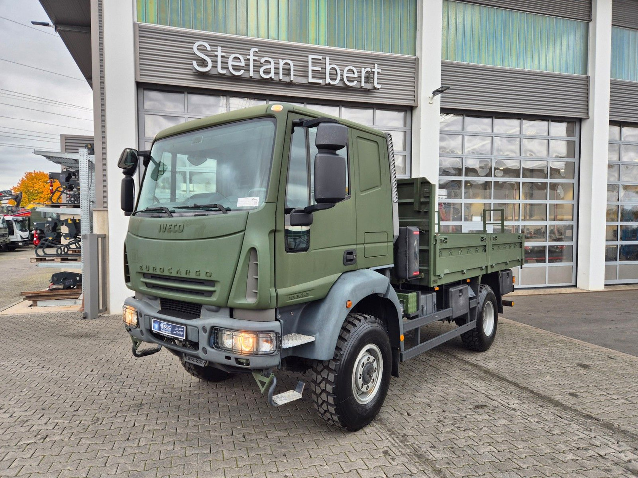 Iveco Eurocargo ML100E22WM-BW 4x4 Pritsche L-Haus Bett - Бордови камион: снимка 1 Iveco Eurocargo ML100E22WM-BW 4x4 Pritsche L-Haus Bett - Бордови камион: снимка 1