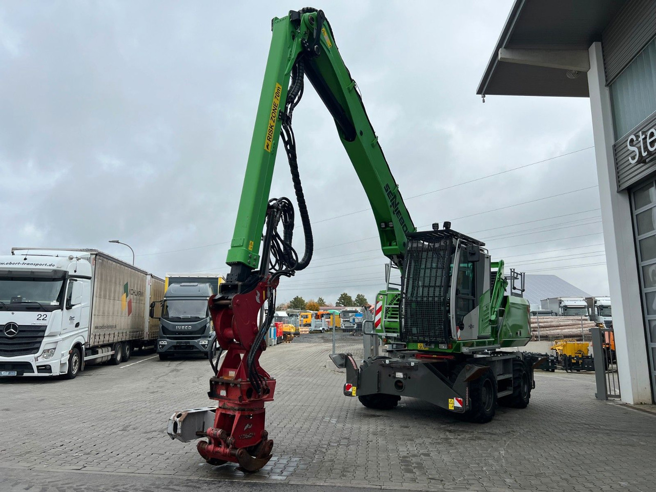 Sennebogen 718 / inkl. Vosch Fällzange / nur 1.965h! - Колесен багер: снимка 5 Sennebogen 718 / inkl. Vosch Fällzange / nur 1.965h! - Колесен багер: снимка 5