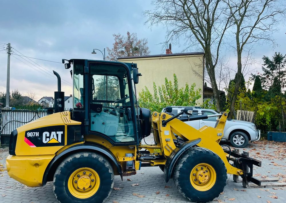 Caterpillar 907H - Колесен товарач: снимка 1 Caterpillar 907H - Колесен товарач: снимка 1