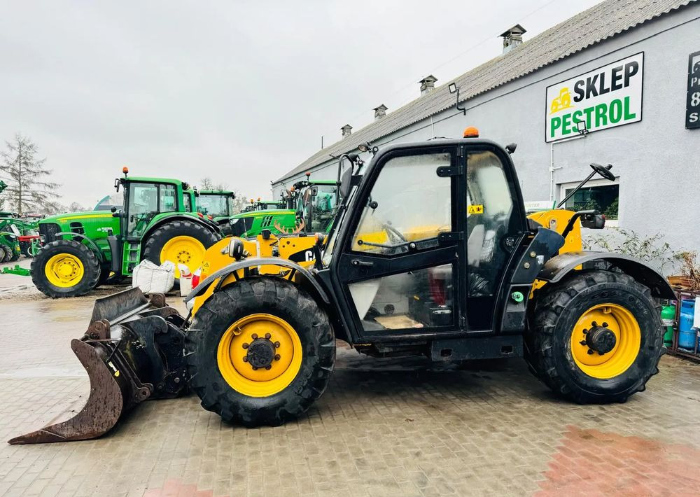 Caterpillar TH 336 - Телескопичен товарач: снимка 3 Caterpillar TH 336 - Телескопичен товарач: снимка 3