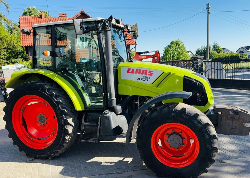 Claas Axos 330 - Трактор: снимка 1 Claas Axos 330 - Трактор: снимка 1