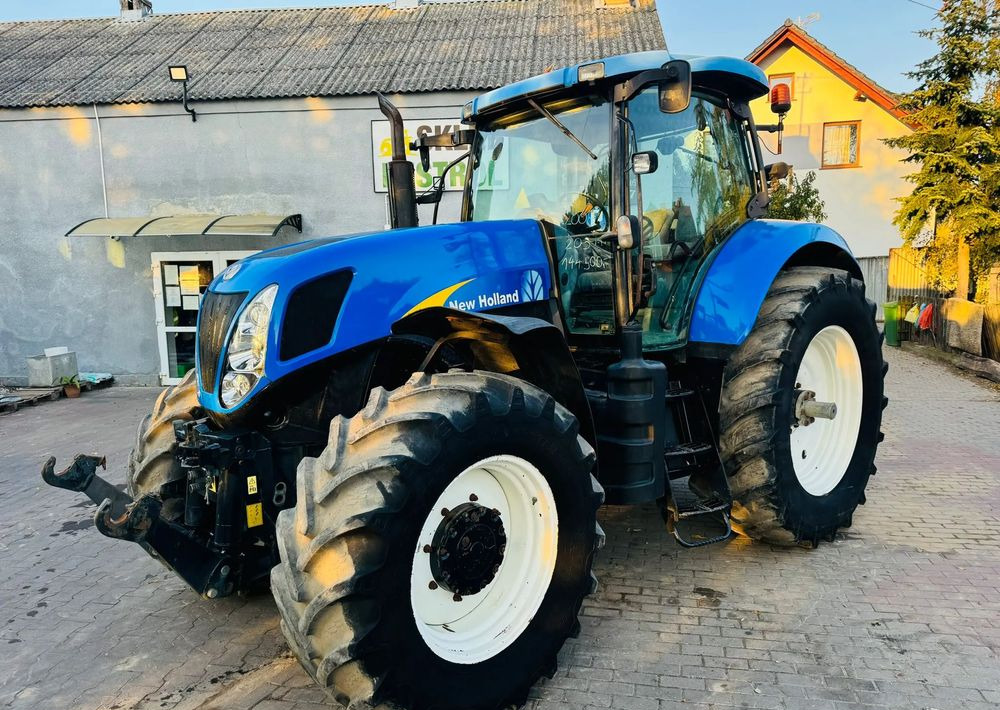 New Holland T7030 - Трактор: снимка 1 New Holland T7030 - Трактор: снимка 1