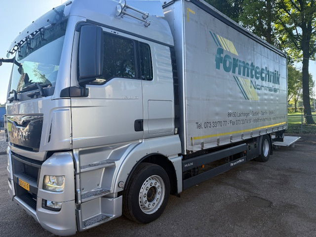 MAN TGX 18.420 - Камион с брезент: снимка 2 MAN TGX 18.420 - Камион с брезент: снимка 2