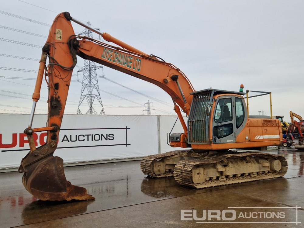 2010 Doosan DX225LC - Верижен багер: снимка 1 2010 Doosan DX225LC - Верижен багер: снимка 1