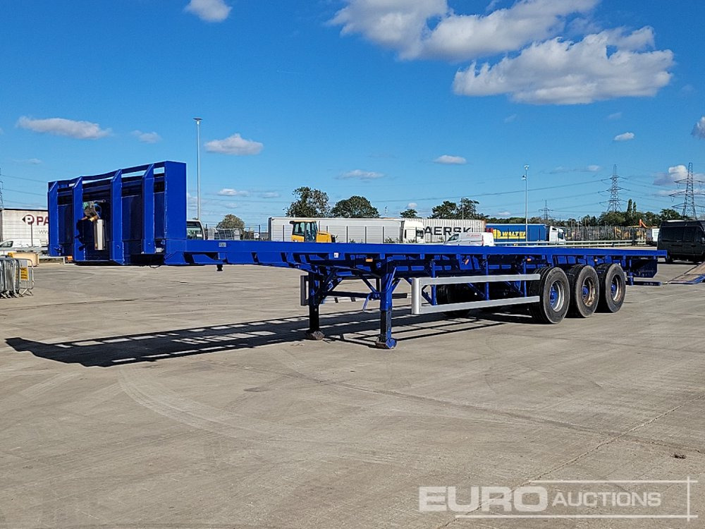 2010 SDC Tri Axle Flat Bed Trailer - Бордово полуремарке/ Платформа: снимка 1 2010 SDC Tri Axle Flat Bed Trailer - Бордово полуремарке/ Платформа: снимка 1