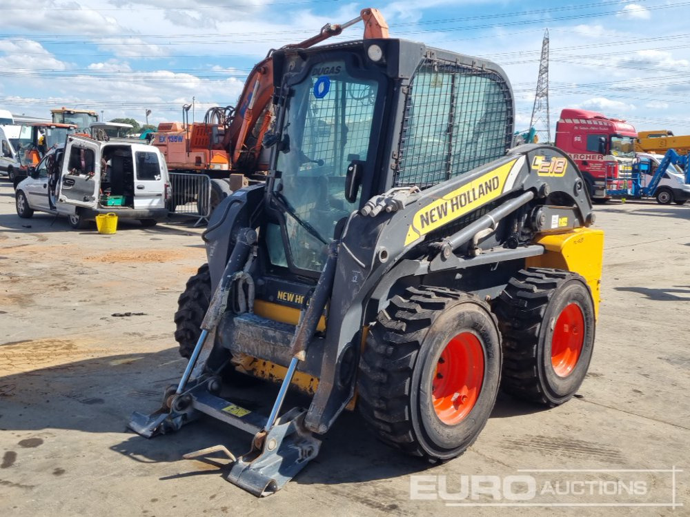 2012 New Holland L218 - Мини челен товарач: снимка 1 2012 New Holland L218 - Мини челен товарач: снимка 1