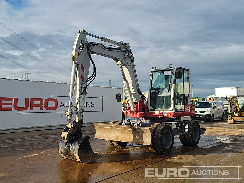2014 Takeuchi TB295W - Колесен багер: снимка 1 2014 Takeuchi TB295W - Колесен багер: снимка 1