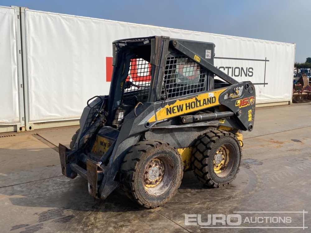 New Holland L160 - Мини челен товарач: снимка 1 New Holland L160 - Мини челен товарач: снимка 1