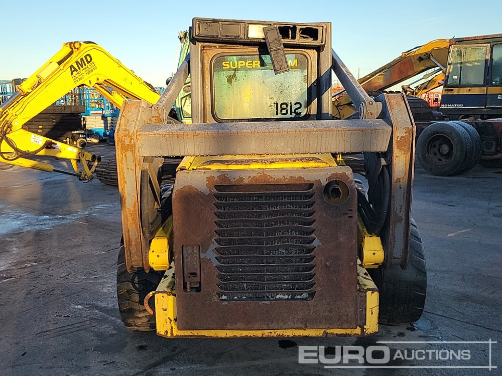 New Holland LS180 - Мини челен товарач: снимка 4 New Holland LS180 - Мини челен товарач: снимка 4