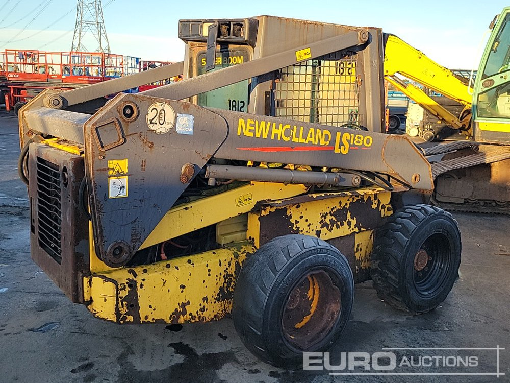 New Holland LS180 - Мини челен товарач: снимка 5 New Holland LS180 - Мини челен товарач: снимка 5