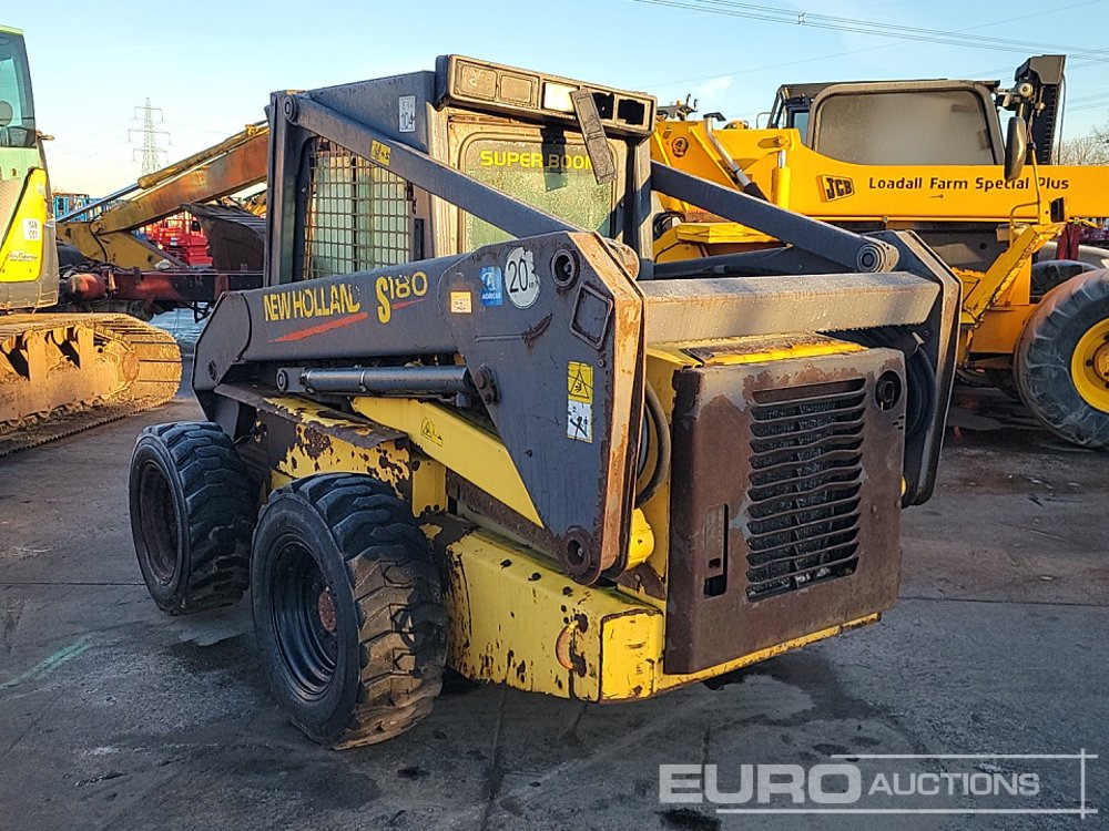New Holland LS180 - Мини челен товарач: снимка 3 New Holland LS180 - Мини челен товарач: снимка 3