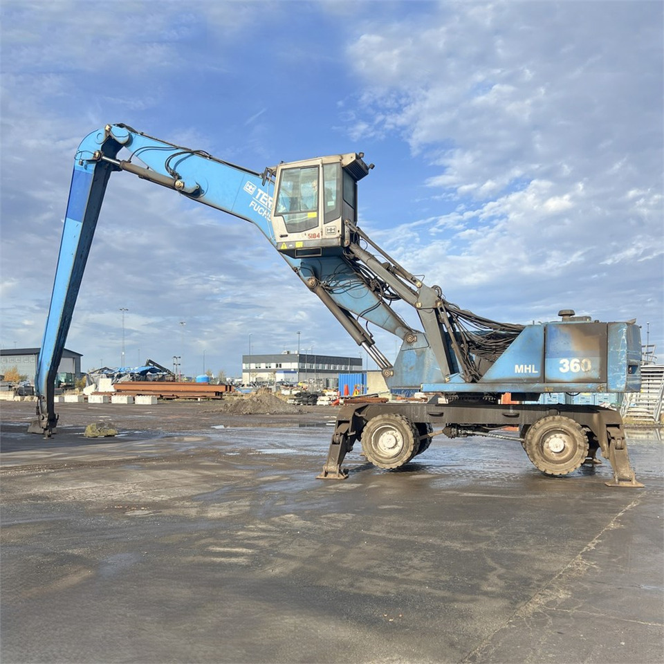 Fuchs MHL 360 - Багер за манипулиране на материали: снимка 2 Fuchs MHL 360 - Багер за манипулиране на материали: снимка 2
