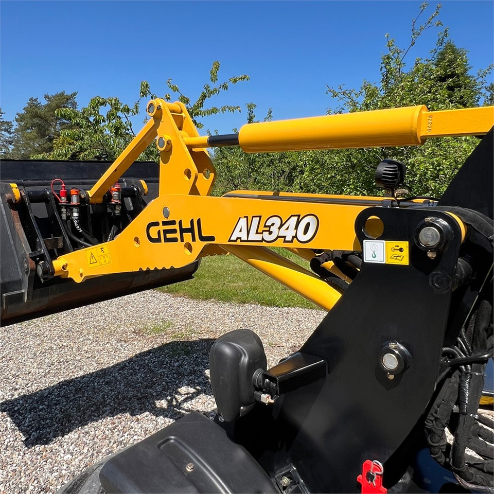 Колесен товарач Gehl AL 340: снимка 27