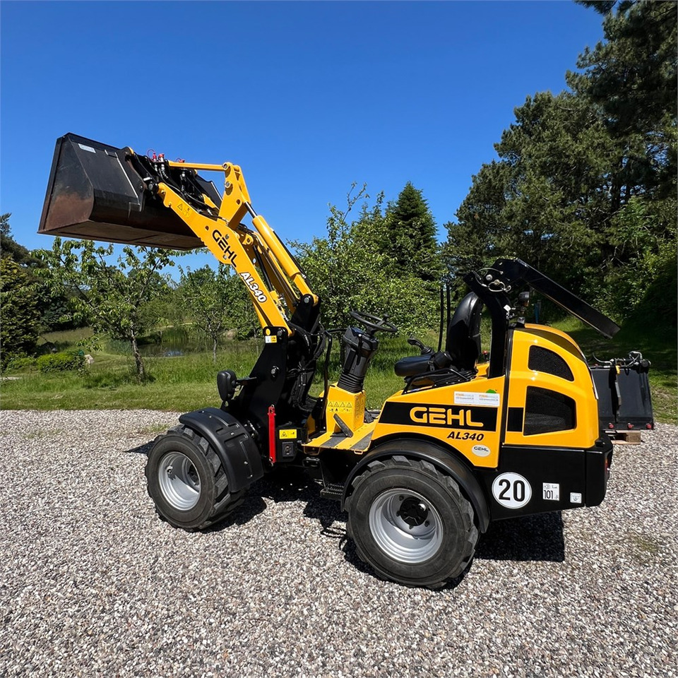 Колесен товарач Gehl AL 340: снимка 12