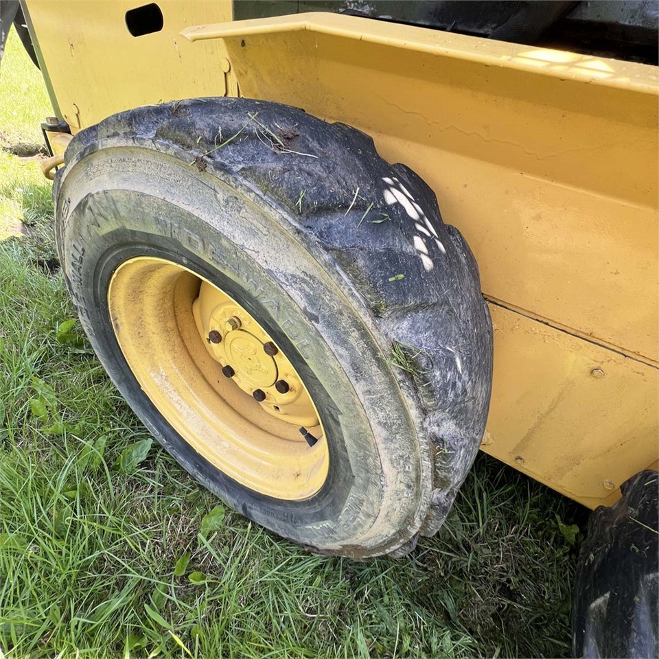 Мини челен товарач New Holland LX465: снимка 24