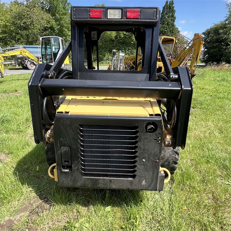 Мини челен товарач New Holland LX465: снимка 10