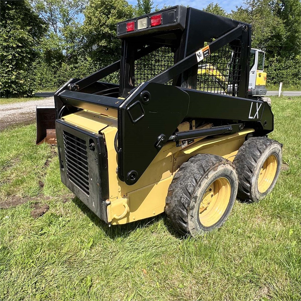 Мини челен товарач New Holland LX465: снимка 9