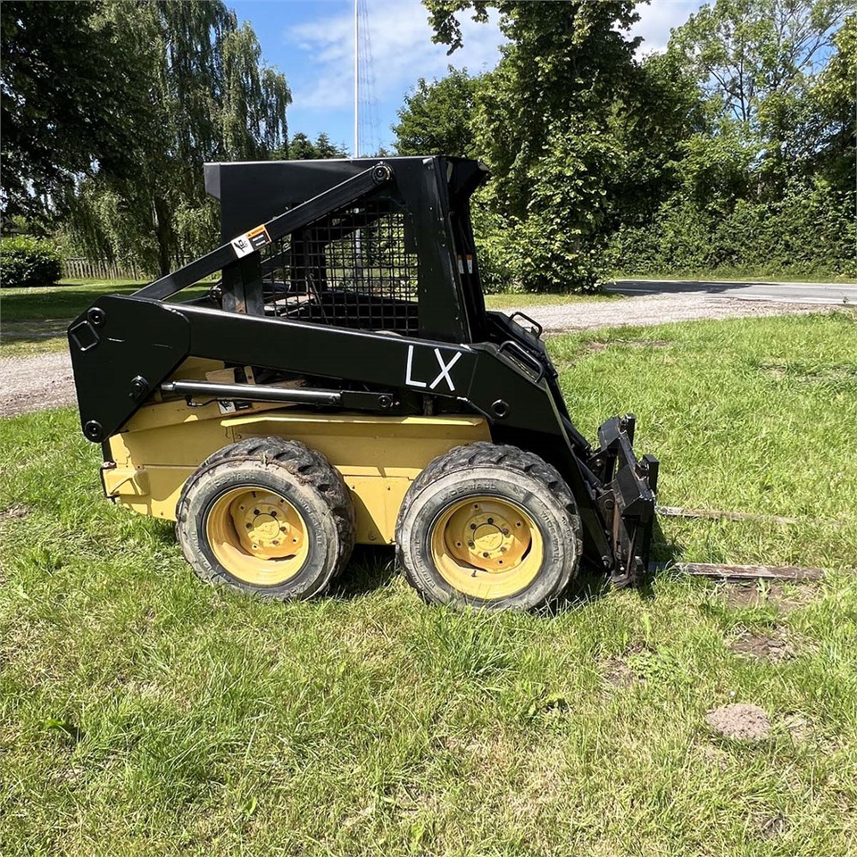 Мини челен товарач New Holland LX465: снимка 8