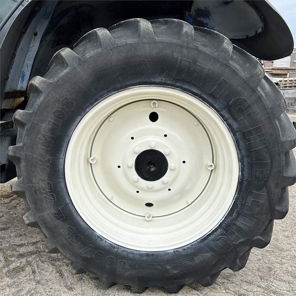 Трактор New Holland TM140: снимка 50