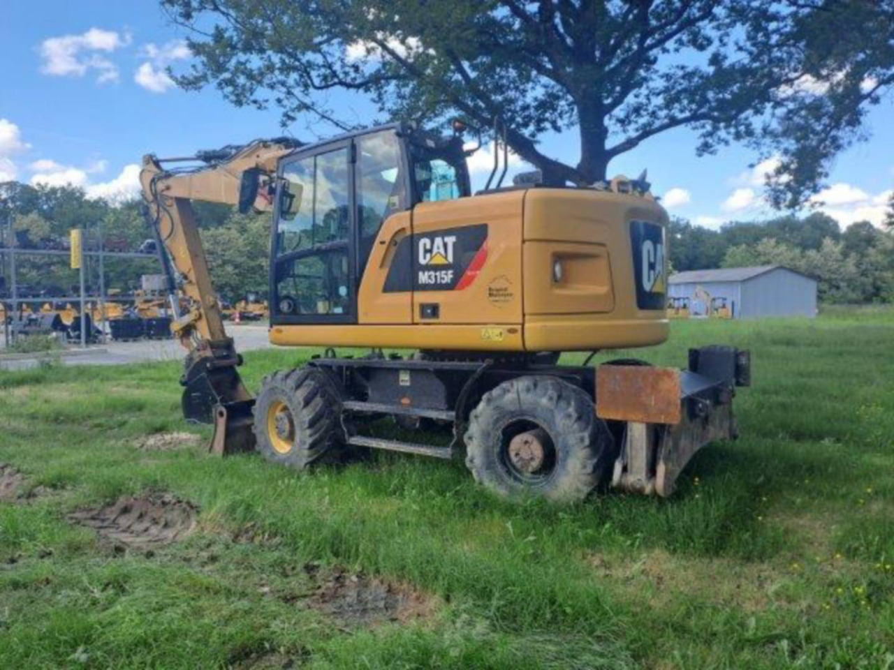 CAT M315F IVC - Колесен багер: снимка 4 CAT M315F IVC - Колесен багер: снимка 4