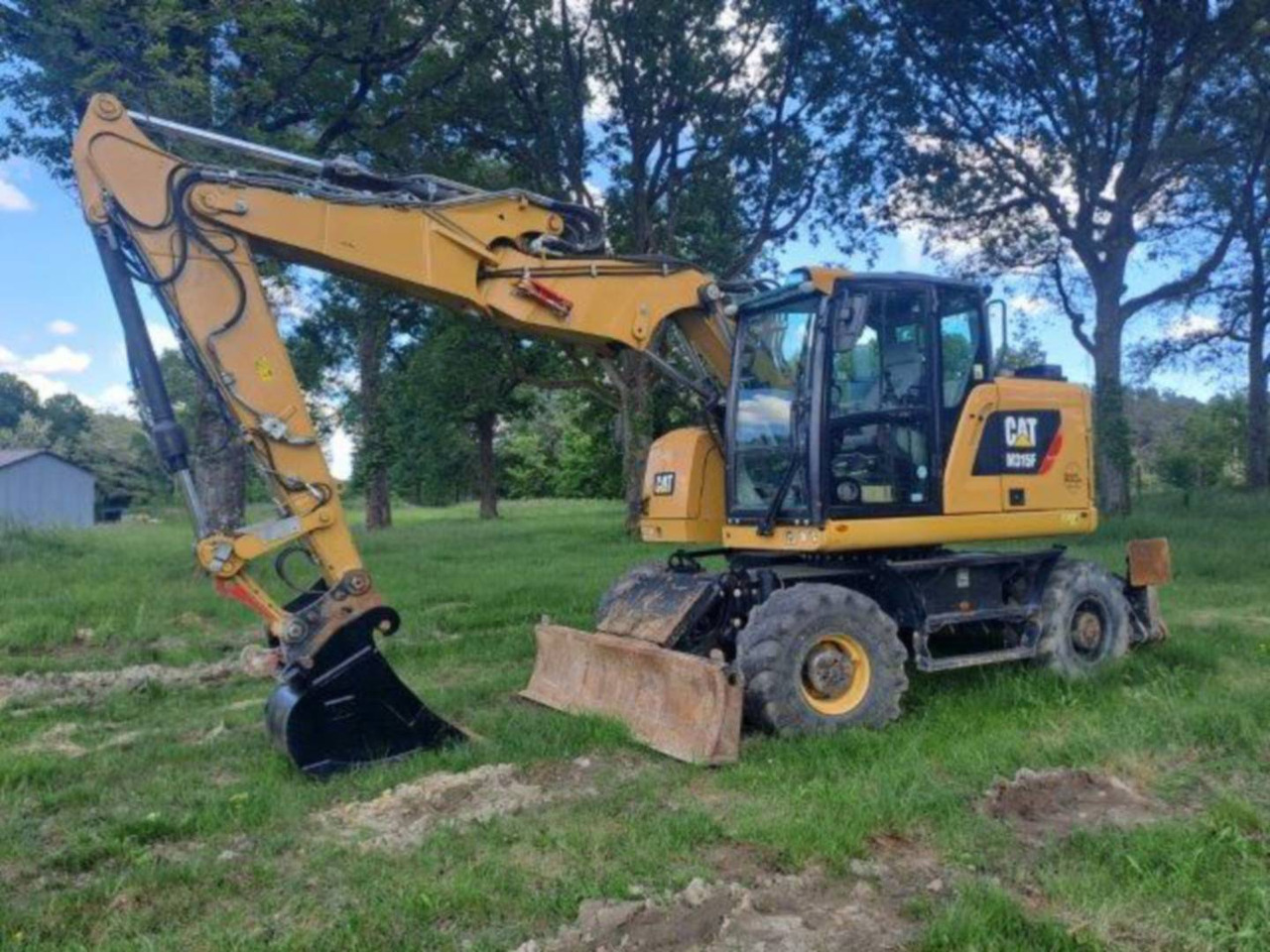 CAT M315F IVC - Колесен багер: снимка 1 CAT M315F IVC - Колесен багер: снимка 1