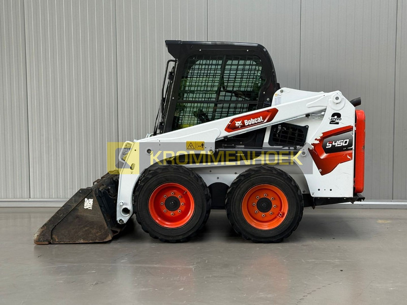 Bobcat S 450 - Мини челен товарач: снимка 1 Bobcat S 450 - Мини челен товарач: снимка 1