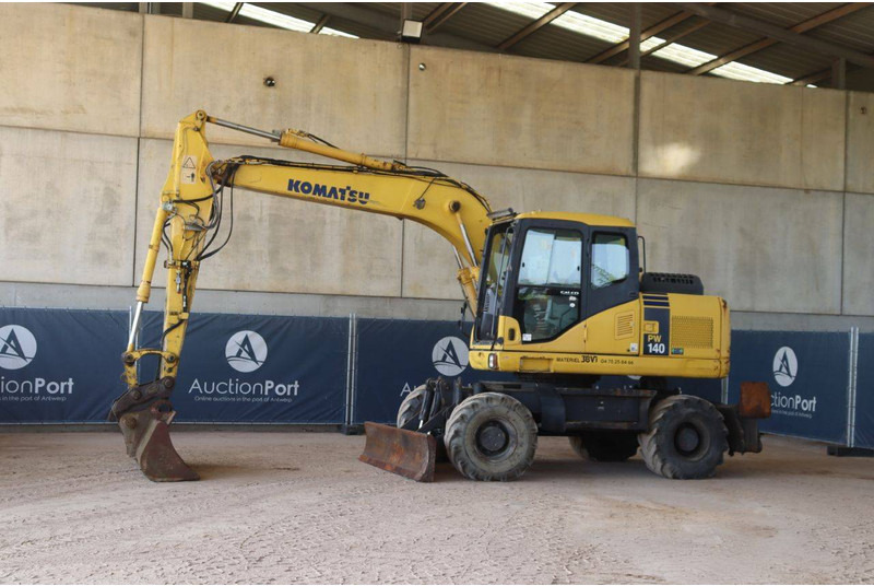 Komatsu PW140-7 - Колесен багер: снимка 1 Komatsu PW140-7 - Колесен багер: снимка 1
