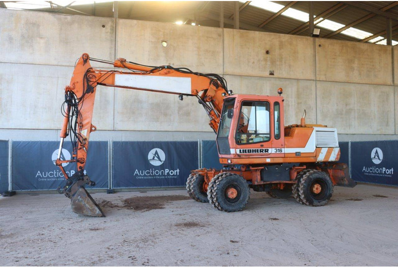 Liebherr A316 - Колесен багер: снимка 1 Liebherr A316 - Колесен багер: снимка 1