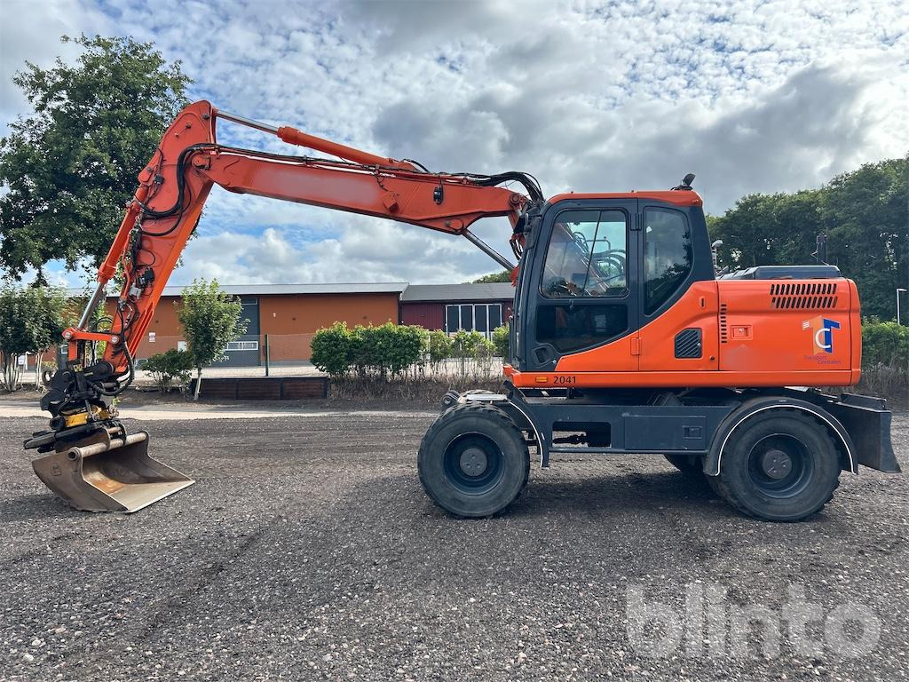 Doosan DX160W - Колесен багер: снимка 1 Doosan DX160W - Колесен багер: снимка 1