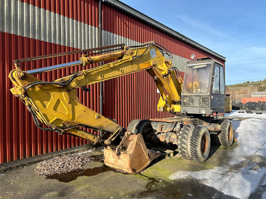 John Deere JD44 - Колесен багер: снимка 1 John Deere JD44 - Колесен багер: снимка 1