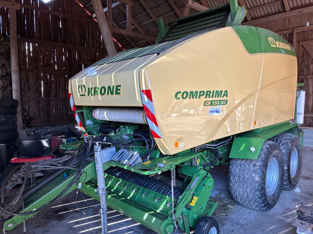 Krone Comprima CF 155 xc - Рулонна сламопреса: снимка 1 Krone Comprima CF 155 xc - Рулонна сламопреса: снимка 1