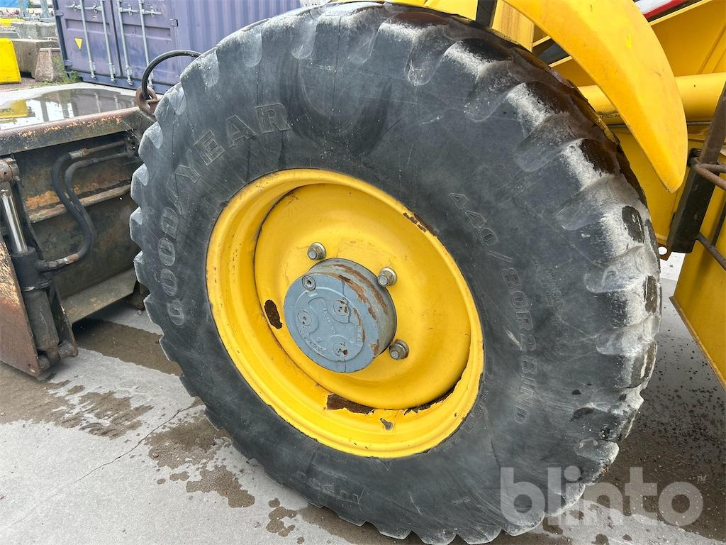 Багер-товарач New Holland LB115 4WD: снимка 13
