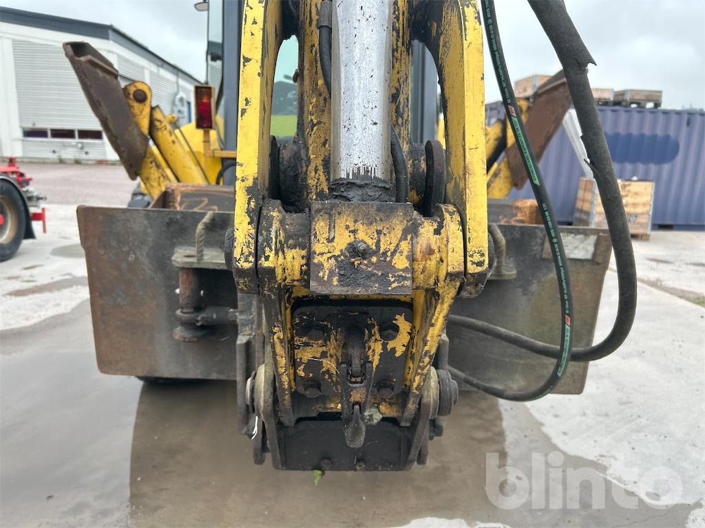 Багер-товарач New Holland LB115 4WD: снимка 42