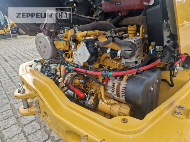Колесен товарач Cat 907M: снимка 19