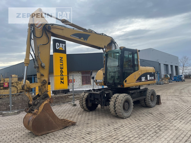 Cat M316C - Колесен багер: снимка 1 Cat M316C - Колесен багер: снимка 1