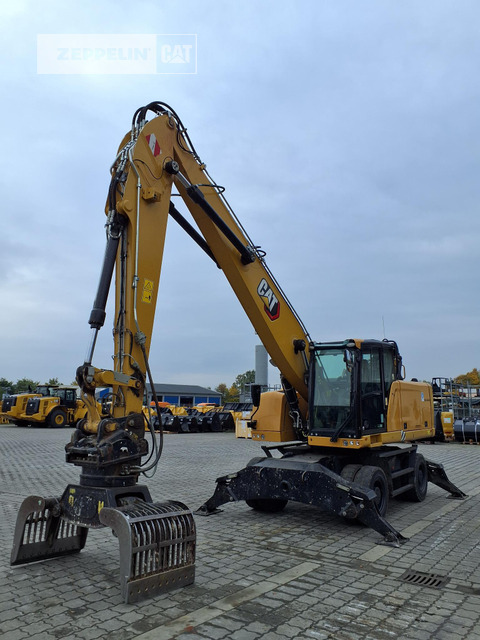 Cat MH3022-06C - Багер за манипулиране на материали: снимка 1 Cat MH3022-06C - Багер за манипулиране на материали: снимка 1