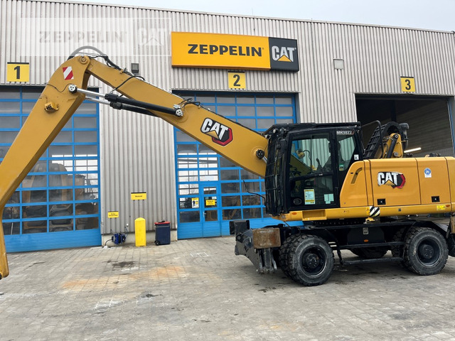 Cat MH3022-06C - Багер за манипулиране на материали: снимка 1 Cat MH3022-06C - Багер за манипулиране на материали: снимка 1