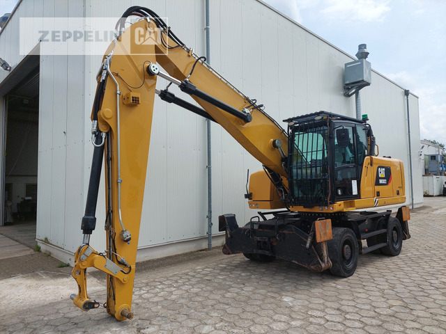 Cat MH3022-06C - Багер за манипулиране на материали: снимка 1 Cat MH3022-06C - Багер за манипулиране на материали: снимка 1