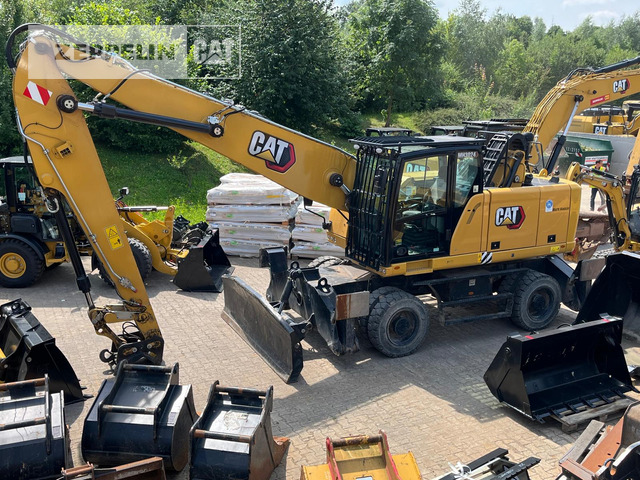 Cat MH3024-06C - Багер за манипулиране на материали: снимка 1 Cat MH3024-06C - Багер за манипулиране на материали: снимка 1
