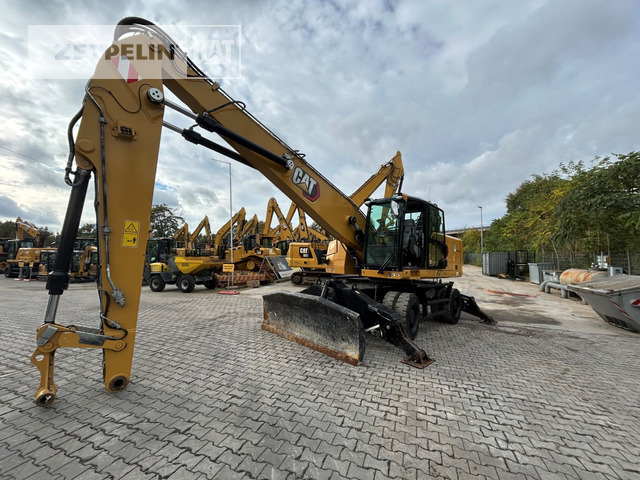 Cat MH3024-06C - Багер за манипулиране на материали: снимка 1 Cat MH3024-06C - Багер за манипулиране на материали: снимка 1