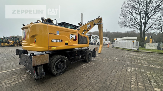 Cat MH3024-06C - Багер за манипулиране на материали: снимка 3 Cat MH3024-06C - Багер за манипулиране на материали: снимка 3