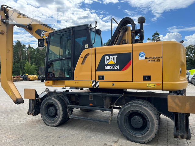 Cat MH3024-06C - Багер за манипулиране на материали: снимка 1 Cat MH3024-06C - Багер за манипулиране на материали: снимка 1