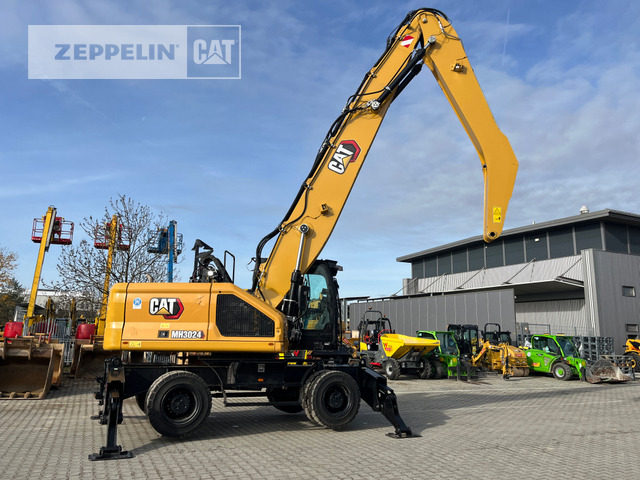 Cat MH3024-07A - Багер за манипулиране на материали: снимка 3 Cat MH3024-07A - Багер за манипулиране на материали: снимка 3