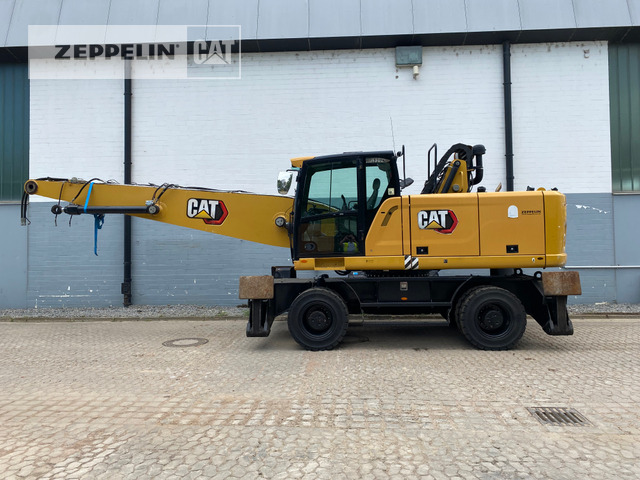 Cat MH3026-06C - Багер за манипулиране на материали: снимка 1 Cat MH3026-06C - Багер за манипулиране на материали: снимка 1